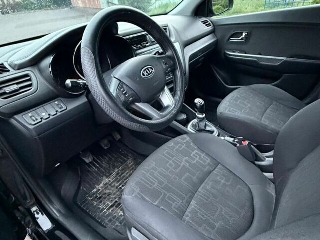 Черный Киа Рио, объемом двигателя 1.6 л и пробегом 94 тыс. км за 7300 $, фото 9 на Automoto.ua