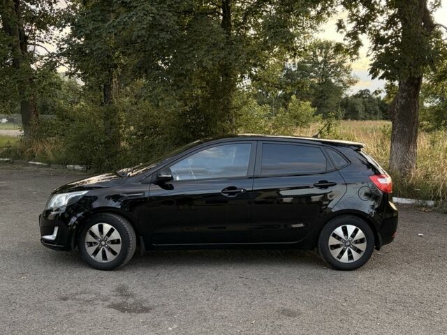 Чорний Кіа Ріо, об'ємом двигуна 1.6 л та пробігом 165 тис. км за 7800 $, фото 3 на Automoto.ua