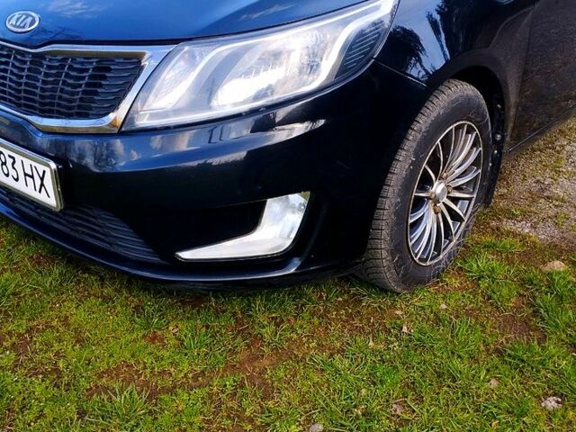Черный Киа Рио, объемом двигателя 1.6 л и пробегом 199 тыс. км за 7000 $, фото 1 на Automoto.ua