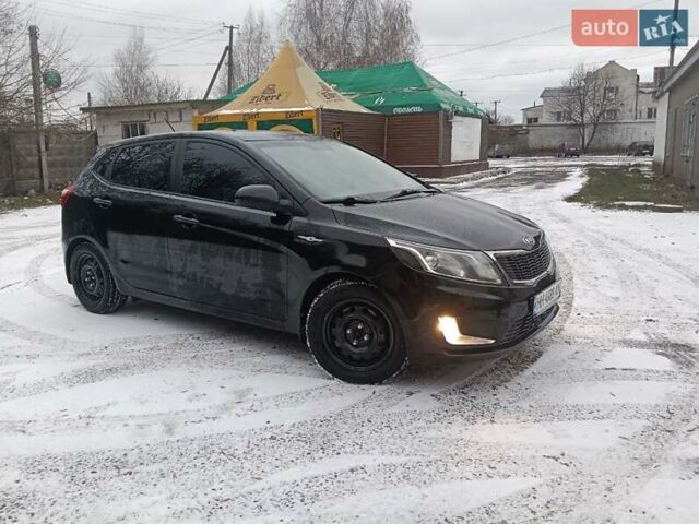 Чорний Кіа Ріо, об'ємом двигуна 1.6 л та пробігом 157 тис. км за 8300 $, фото 6 на Automoto.ua