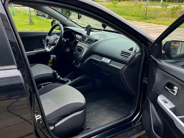 Чорний Кіа Ріо, об'ємом двигуна 1.6 л та пробігом 17600 тис. км за 7300 $, фото 7 на Automoto.ua