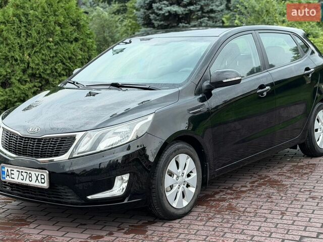Черный Киа Рио, объемом двигателя 1.6 л и пробегом 94 тыс. км за 7300 $, фото 1 на Automoto.ua