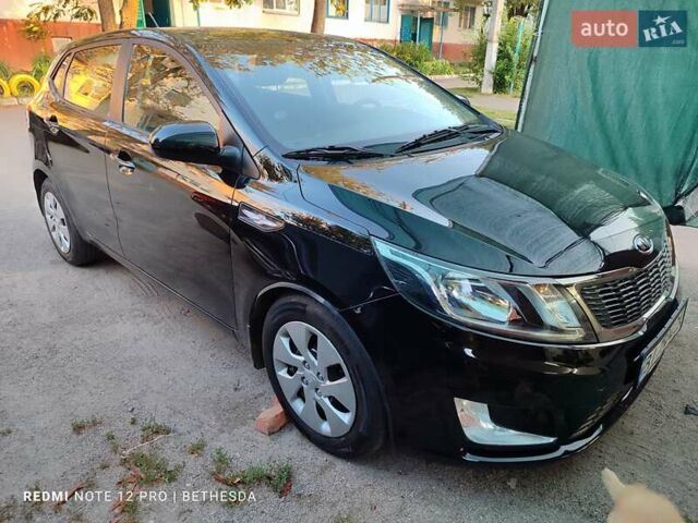 Чорний Кіа Ріо, об'ємом двигуна 1.4 л та пробігом 41 тис. км за 8500 $, фото 3 на Automoto.ua