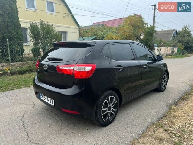 Чорний Кіа Ріо, об'ємом двигуна 1.59 л та пробігом 165 тис. км за 6400 $, фото 5 на Automoto.ua