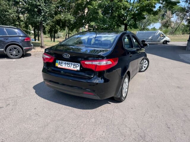 Чорний Кіа Ріо, об'ємом двигуна 1.4 л та пробігом 53 тис. км за 8507 $, фото 2 на Automoto.ua