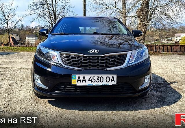 Черный Киа Рио, объемом двигателя 1.6 л и пробегом 62 тыс. км за 9350 $, фото 1 на Automoto.ua