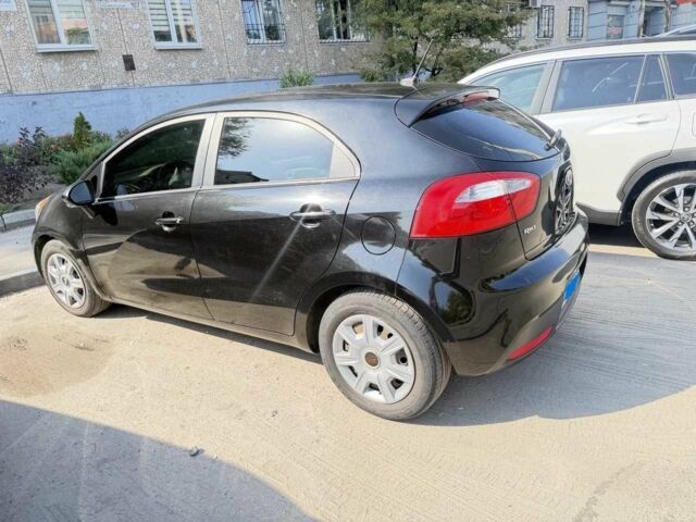 Чорний Кіа Ріо, об'ємом двигуна 1.6 л та пробігом 133 тис. км за 6023 $, фото 5 на Automoto.ua
