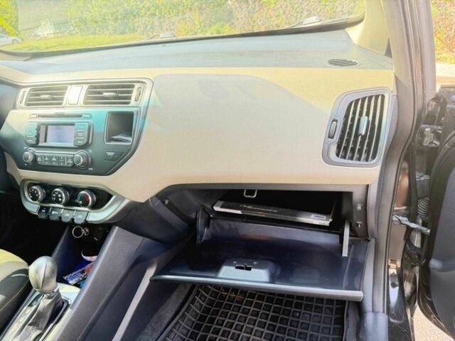 Чорний Кіа Ріо, об'ємом двигуна 1.6 л та пробігом 133 тис. км за 6023 $, фото 10 на Automoto.ua