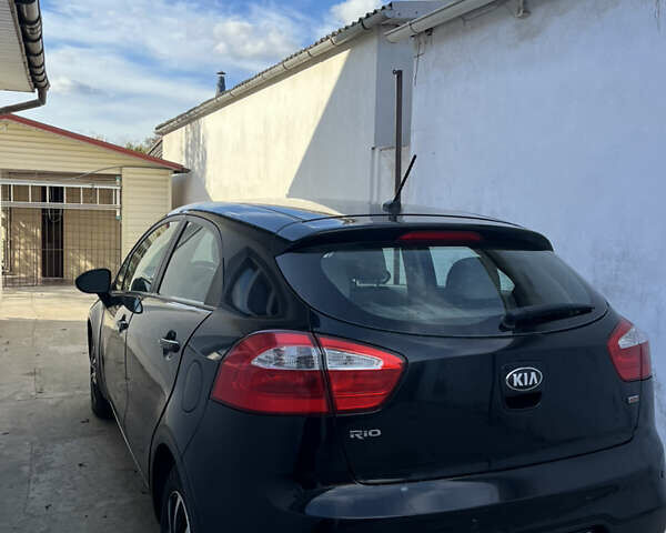 Черный Киа Рио, объемом двигателя 1.6 л и пробегом 280 тыс. км за 7700 $, фото 2 на Automoto.ua