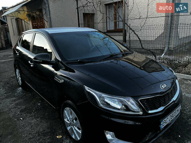 Черный Киа Рио, объемом двигателя 1.6 л и пробегом 162 тыс. км за 7000 $, фото 1 на Automoto.ua