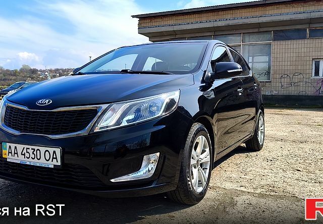 Черный Киа Рио, объемом двигателя 1.6 л и пробегом 62 тыс. км за 9350 $, фото 4 на Automoto.ua