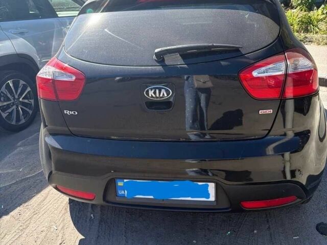 Чорний Кіа Ріо, об'ємом двигуна 1.6 л та пробігом 133 тис. км за 6023 $, фото 6 на Automoto.ua