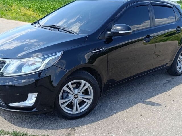 Черный Киа Рио, объемом двигателя 1.59 л и пробегом 67 тыс. км за 8500 $, фото 29 на Automoto.ua