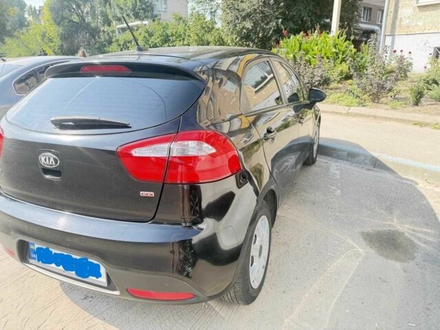 Чорний Кіа Ріо, об'ємом двигуна 1.6 л та пробігом 133 тис. км за 6023 $, фото 1 на Automoto.ua