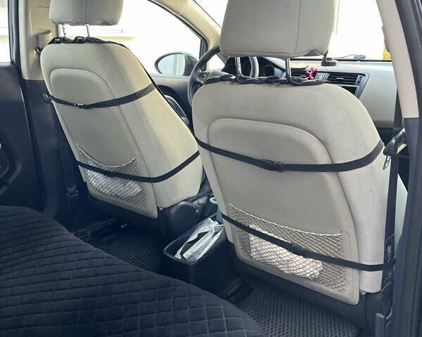 Черный Киа Рио, объемом двигателя 1.6 л и пробегом 280 тыс. км за 7700 $, фото 5 на Automoto.ua