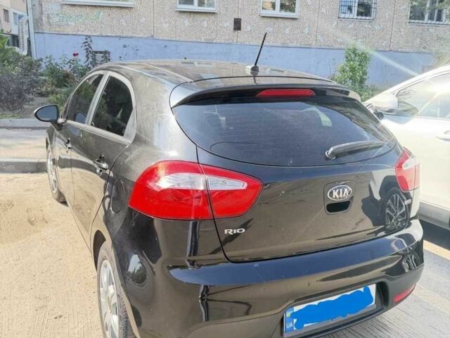 Чорний Кіа Ріо, об'ємом двигуна 1.6 л та пробігом 133 тис. км за 6023 $, фото 2 на Automoto.ua