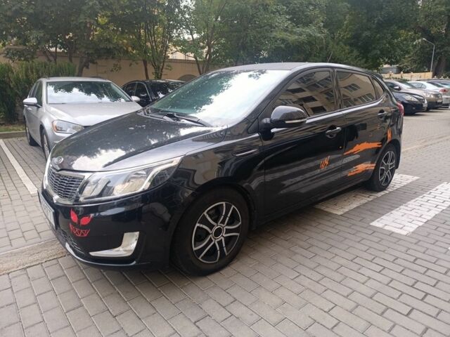 Чорний Кіа Ріо, об'ємом двигуна 0 л та пробігом 205 тис. км за 5998 $, фото 5 на Automoto.ua
