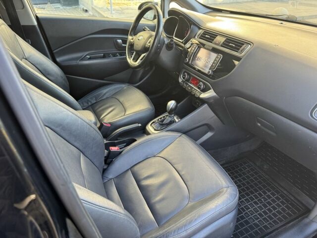 Черный Киа Рио, объемом двигателя 1.4 л и пробегом 159 тыс. км за 11200 $, фото 14 на Automoto.ua