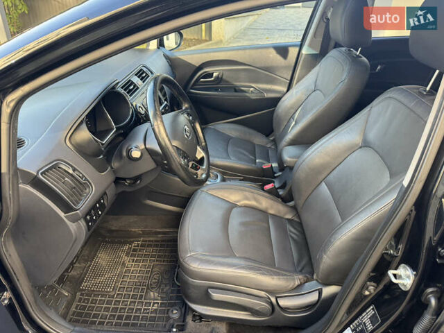 Черный Киа Рио, объемом двигателя 1.4 л и пробегом 159 тыс. км за 11500 $, фото 14 на Automoto.ua