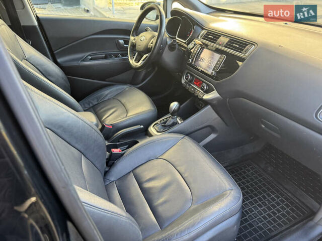 Черный Киа Рио, объемом двигателя 1.4 л и пробегом 159 тыс. км за 11500 $, фото 24 на Automoto.ua