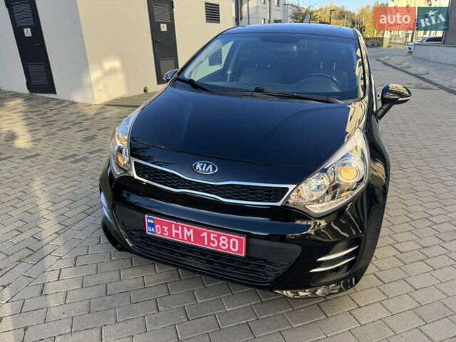 Черный Киа Рио, объемом двигателя 1.4 л и пробегом 159 тыс. км за 11500 $, фото 1 на Automoto.ua