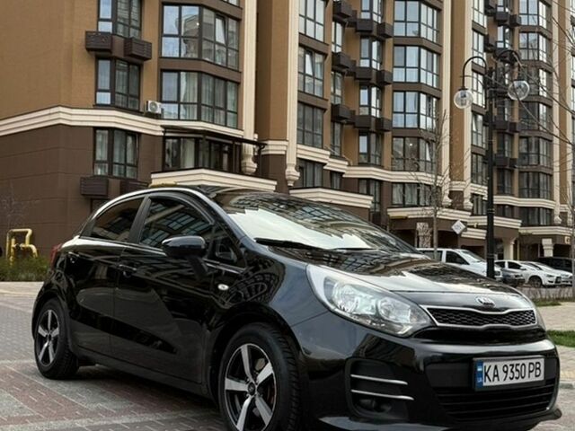 Чорний Кіа Ріо, об'ємом двигуна 1.4 л та пробігом 74 тис. км за 12500 $, фото 16 на Automoto.ua