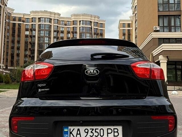 Чорний Кіа Ріо, об'ємом двигуна 1.4 л та пробігом 74 тис. км за 12500 $, фото 3 на Automoto.ua