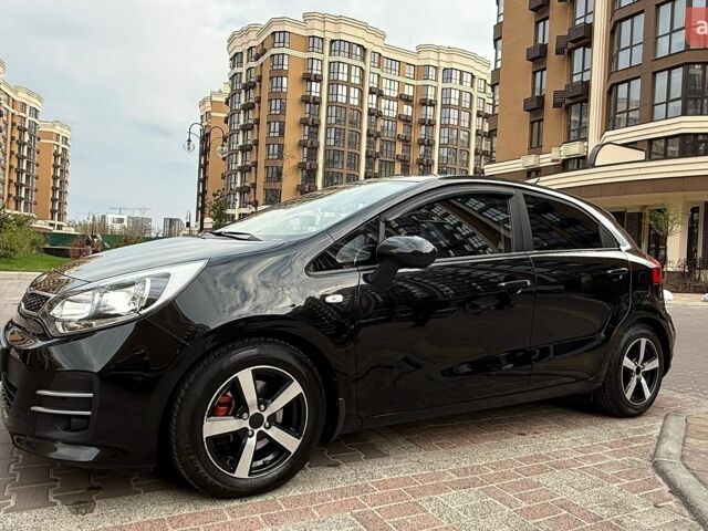 Чорний Кіа Ріо, об'ємом двигуна 1.4 л та пробігом 74 тис. км за 12500 $, фото 14 на Automoto.ua