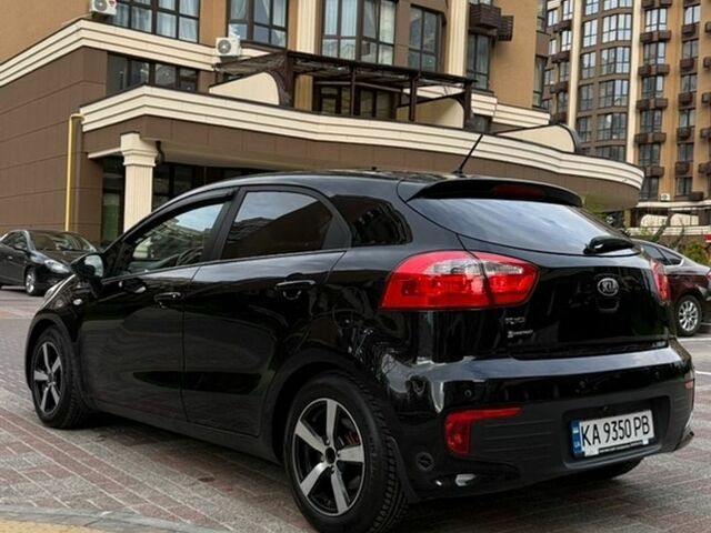 Чорний Кіа Ріо, об'ємом двигуна 1.4 л та пробігом 74 тис. км за 12500 $, фото 2 на Automoto.ua