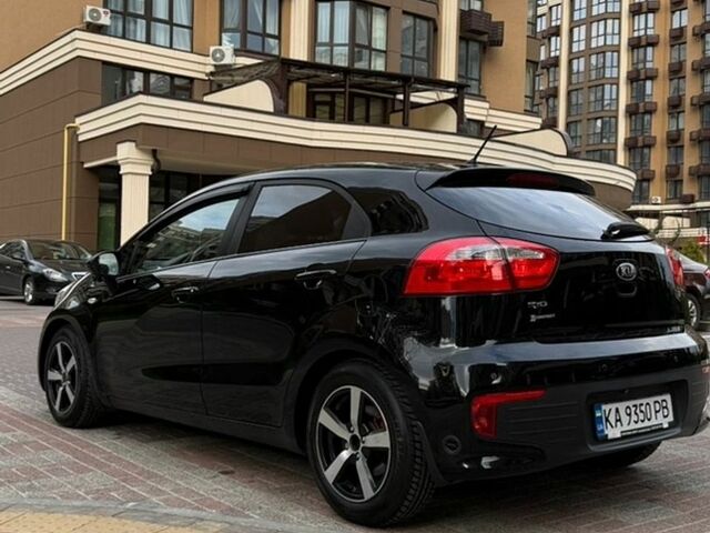 Чорний Кіа Ріо, об'ємом двигуна 1.4 л та пробігом 74 тис. км за 12500 $, фото 9 на Automoto.ua