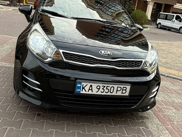 Чорний Кіа Ріо, об'ємом двигуна 1.4 л та пробігом 74 тис. км за 12500 $, фото 13 на Automoto.ua