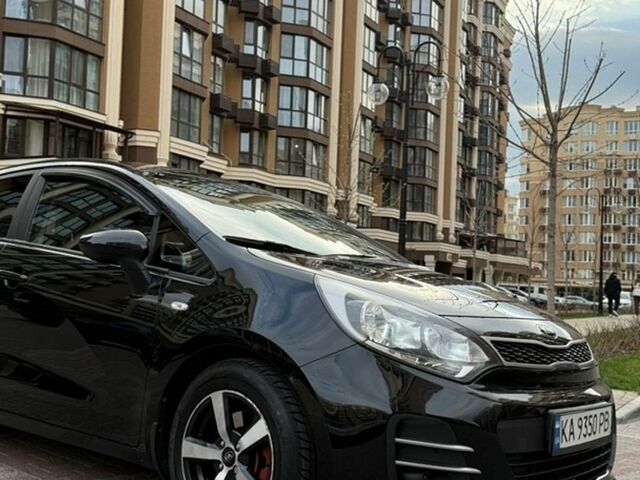 Чорний Кіа Ріо, об'ємом двигуна 1.4 л та пробігом 74 тис. км за 12500 $, фото 7 на Automoto.ua