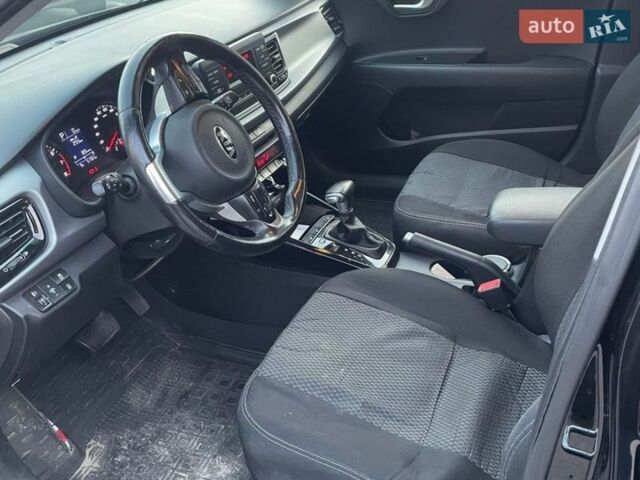 Чорний Кіа Ріо, об'ємом двигуна 1.4 л та пробігом 51 тис. км за 13000 $, фото 7 на Automoto.ua