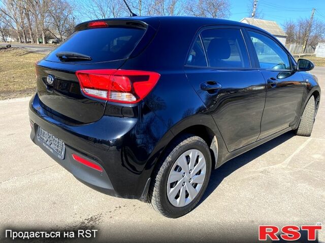 Чорний Кіа Ріо, об'ємом двигуна 1.4 л та пробігом 89 тис. км за 12700 $, фото 2 на Automoto.ua