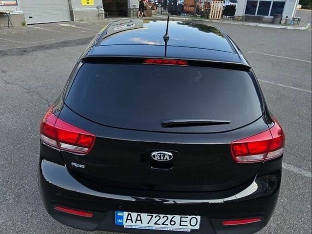 Чорний Кіа Ріо, об'ємом двигуна 1.4 л та пробігом 8 тис. км за 13999 $, фото 10 на Automoto.ua