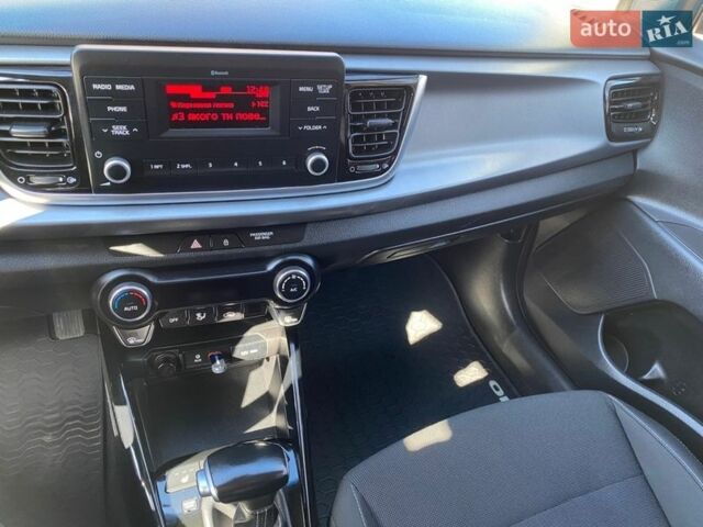 Чорний Кіа Ріо, об'ємом двигуна 1.4 л та пробігом 89 тис. км за 12700 $, фото 37 на Automoto.ua