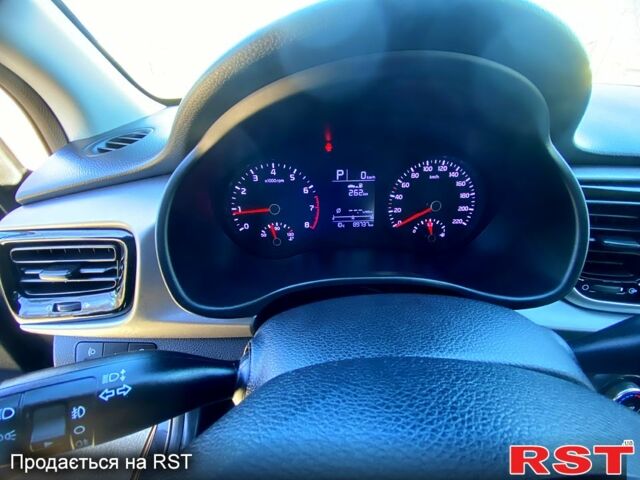 Чорний Кіа Ріо, об'ємом двигуна 1.4 л та пробігом 211 тис. км за 12700 $, фото 8 на Automoto.ua