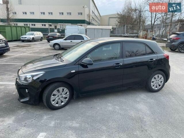 Чорний Кіа Ріо, об'ємом двигуна 1.4 л та пробігом 51 тис. км за 13000 $, фото 4 на Automoto.ua