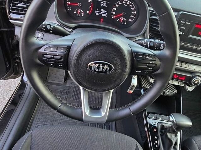 Чорний Кіа Ріо, об'ємом двигуна 1.4 л та пробігом 8 тис. км за 13999 $, фото 13 на Automoto.ua