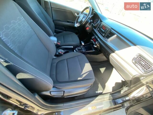 Чорний Кіа Ріо, об'ємом двигуна 1.4 л та пробігом 89 тис. км за 12700 $, фото 7 на Automoto.ua