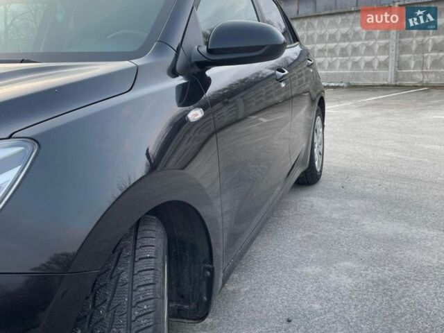 Чорний Кіа Ріо, об'ємом двигуна 1.4 л та пробігом 51 тис. км за 13000 $, фото 10 на Automoto.ua