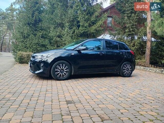 Чорний Кіа Ріо, об'ємом двигуна 1.37 л та пробігом 63 тис. км за 13150 $, фото 6 на Automoto.ua