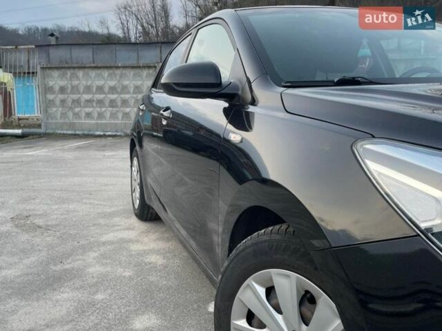 Чорний Кіа Ріо, об'ємом двигуна 1.4 л та пробігом 51 тис. км за 13000 $, фото 11 на Automoto.ua