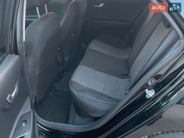 Чорний Кіа Ріо, об'ємом двигуна 1.4 л та пробігом 51 тис. км за 13000 $, фото 8 на Automoto.ua