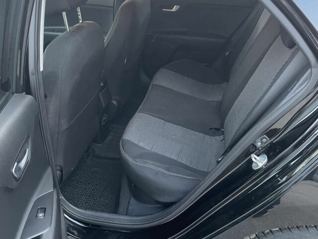 Черный Киа Рио, объемом двигателя 1.4 л и пробегом 51 тыс. км за 13000 $, фото 5 на Automoto.ua
