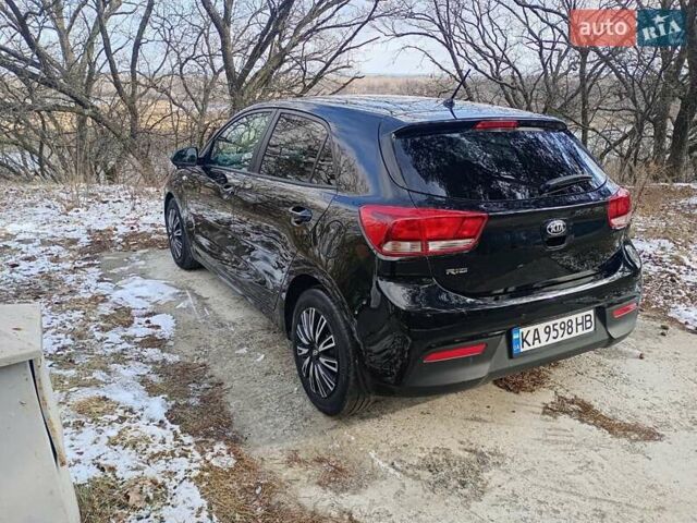 Черный Киа Рио, объемом двигателя 1.4 л и пробегом 63 тыс. км за 13150 $, фото 4 на Automoto.ua