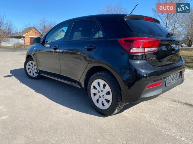 Чорний Кіа Ріо, об'ємом двигуна 1.4 л та пробігом 89 тис. км за 12700 $, фото 21 на Automoto.ua