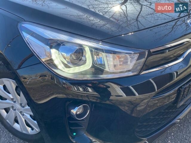 Чорний Кіа Ріо, об'ємом двигуна 1.4 л та пробігом 89 тис. км за 12700 $, фото 20 на Automoto.ua