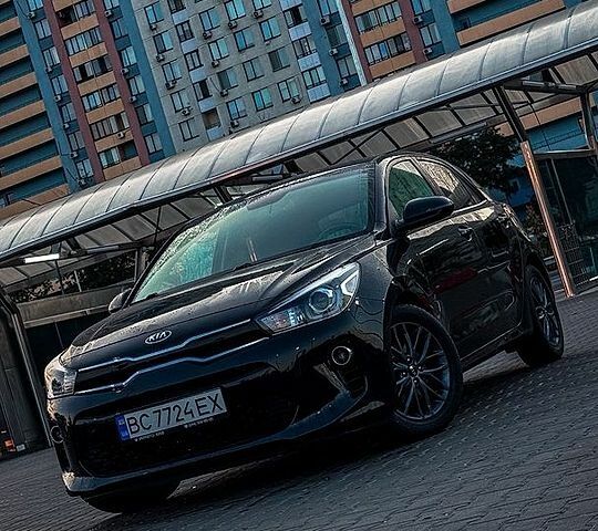 Чорний Кіа Ріо, об'ємом двигуна 1.37 л та пробігом 67 тис. км за 14750 $, фото 2 на Automoto.ua