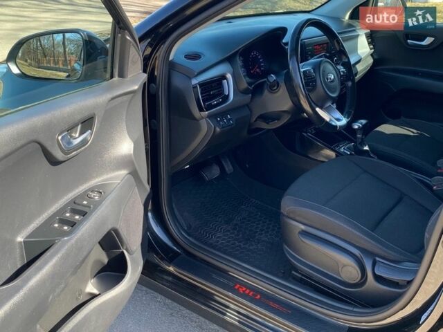 Чорний Кіа Ріо, об'ємом двигуна 1.4 л та пробігом 89 тис. км за 12700 $, фото 38 на Automoto.ua